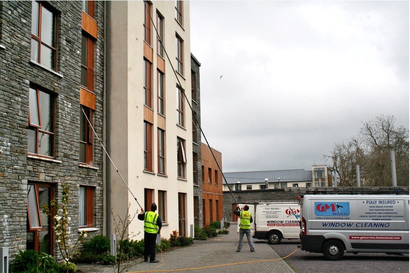 Ladderless Pure Water Window Cleaning of office windows in a Cork city office block by G M Services, Window Cleaning specialists, Cork